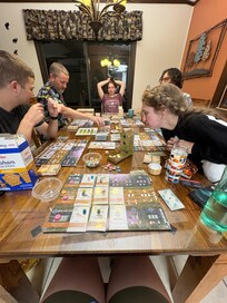 Large table for dining and playing games.