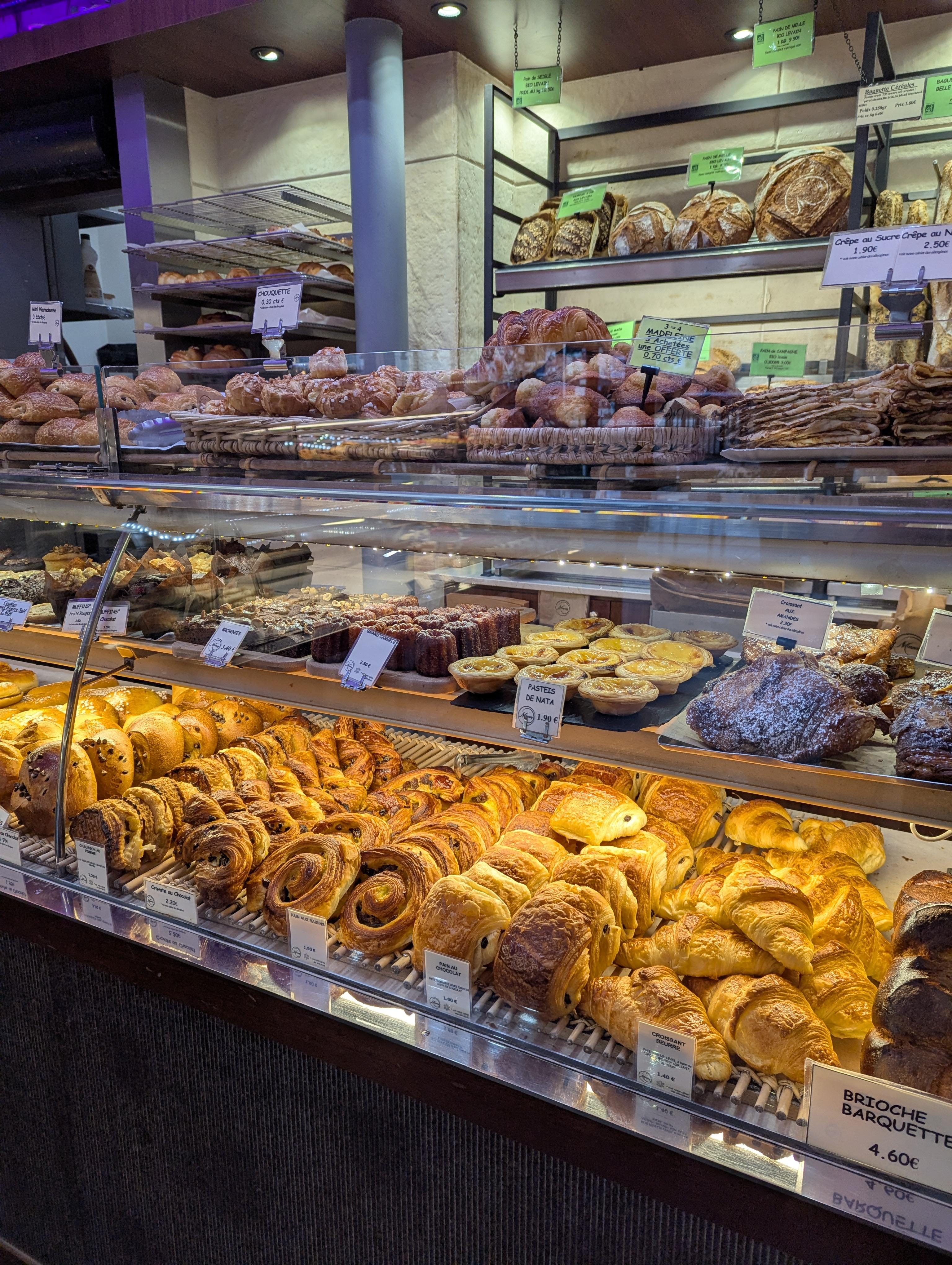 Cafe Marly next door. Fantastic pastries, coffee and hot chocolate! 