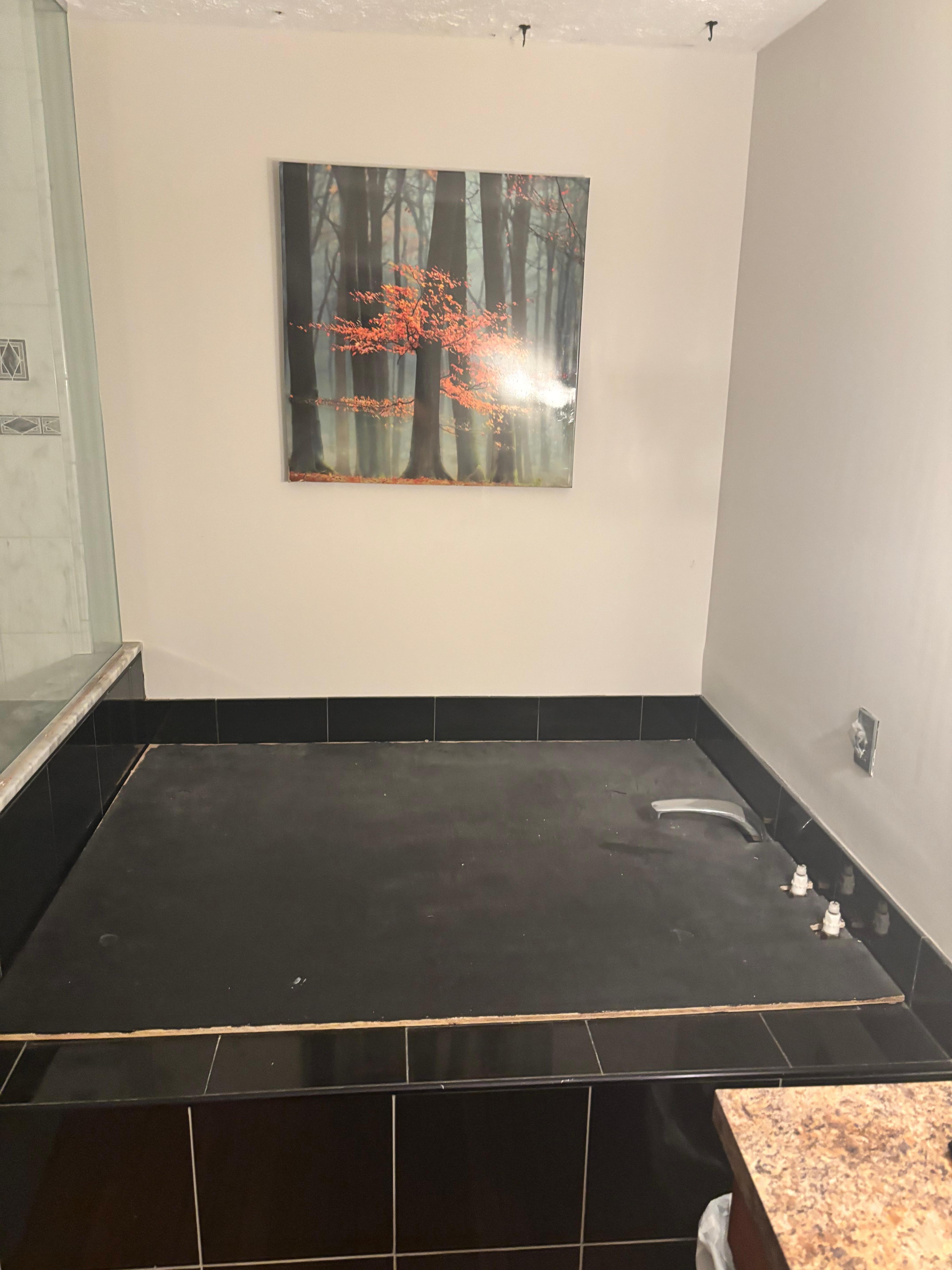 Tub w plywood over it