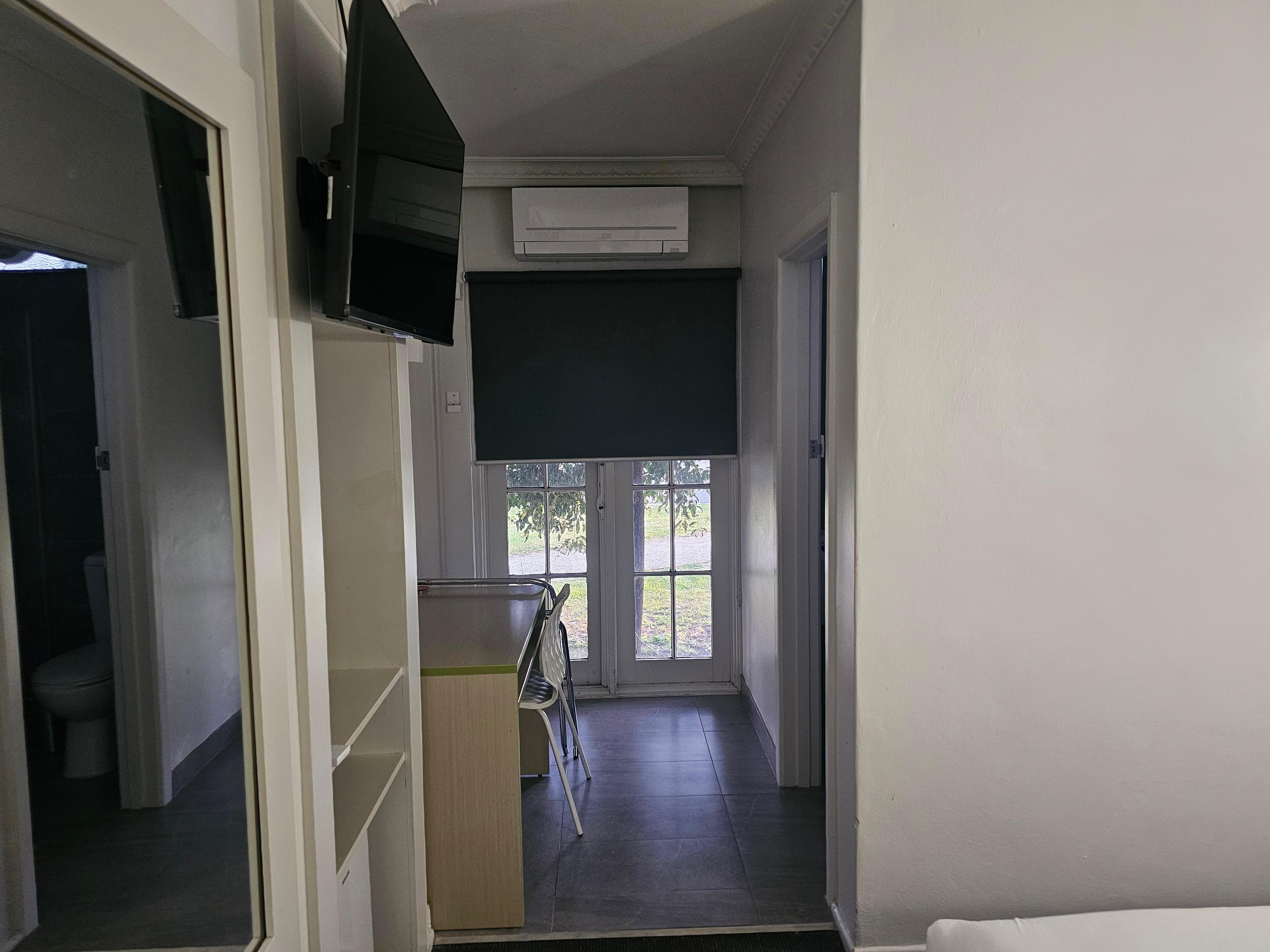 Back-door. Good for smokers.