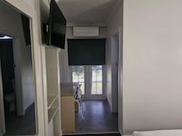 Back-door. Good for smokers.