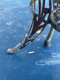 Cigarette butts all over the balcony.