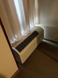 Very loud AC in one room that could not cool down the room, leaving one room muggy and warm.