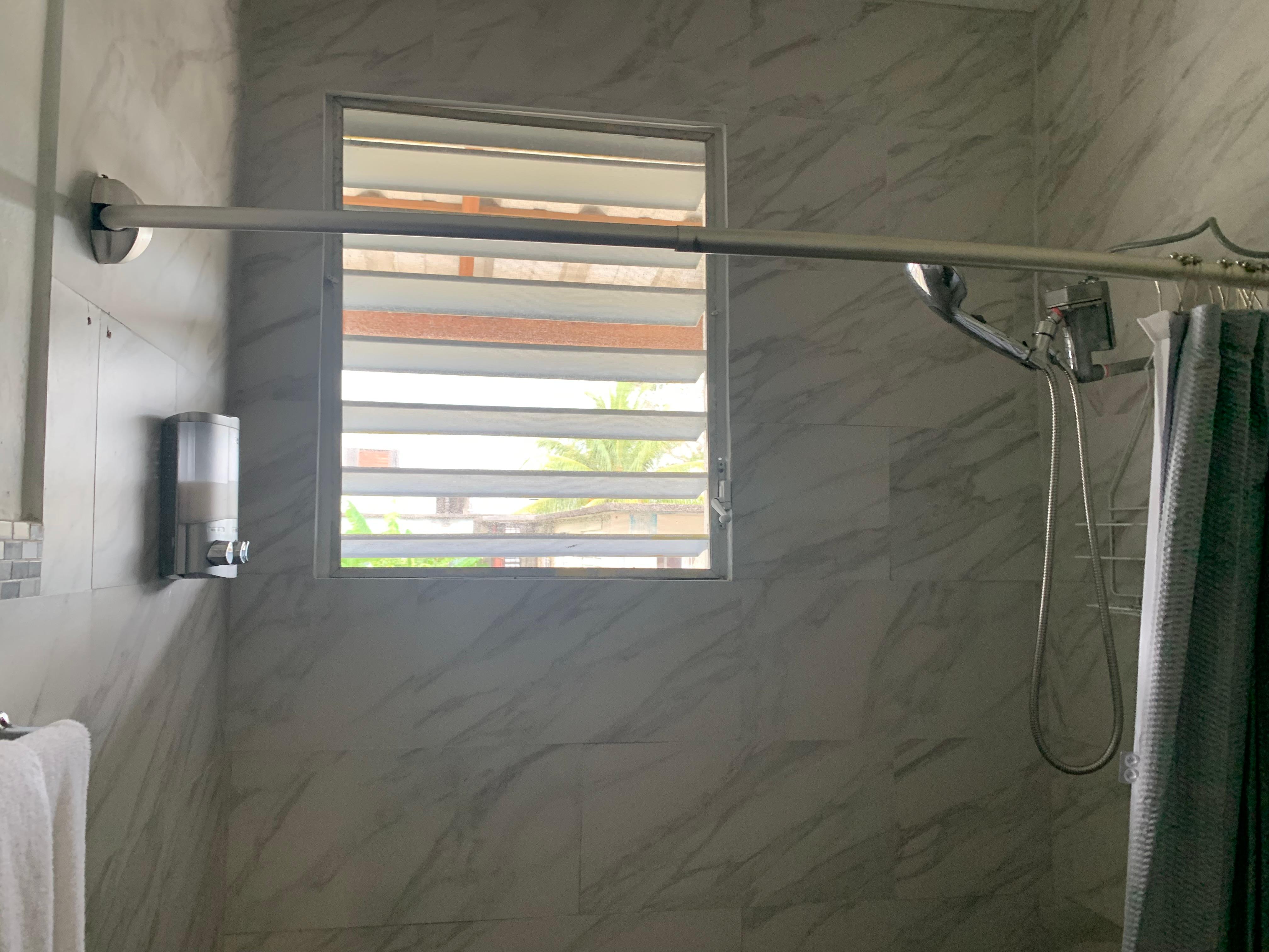 This bathroom window did not close causing it to be unsafe, hot, and noisy.