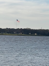 Old Glory across the lake