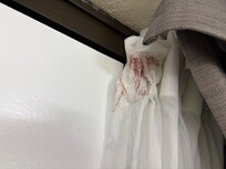 Blood stains on curtains