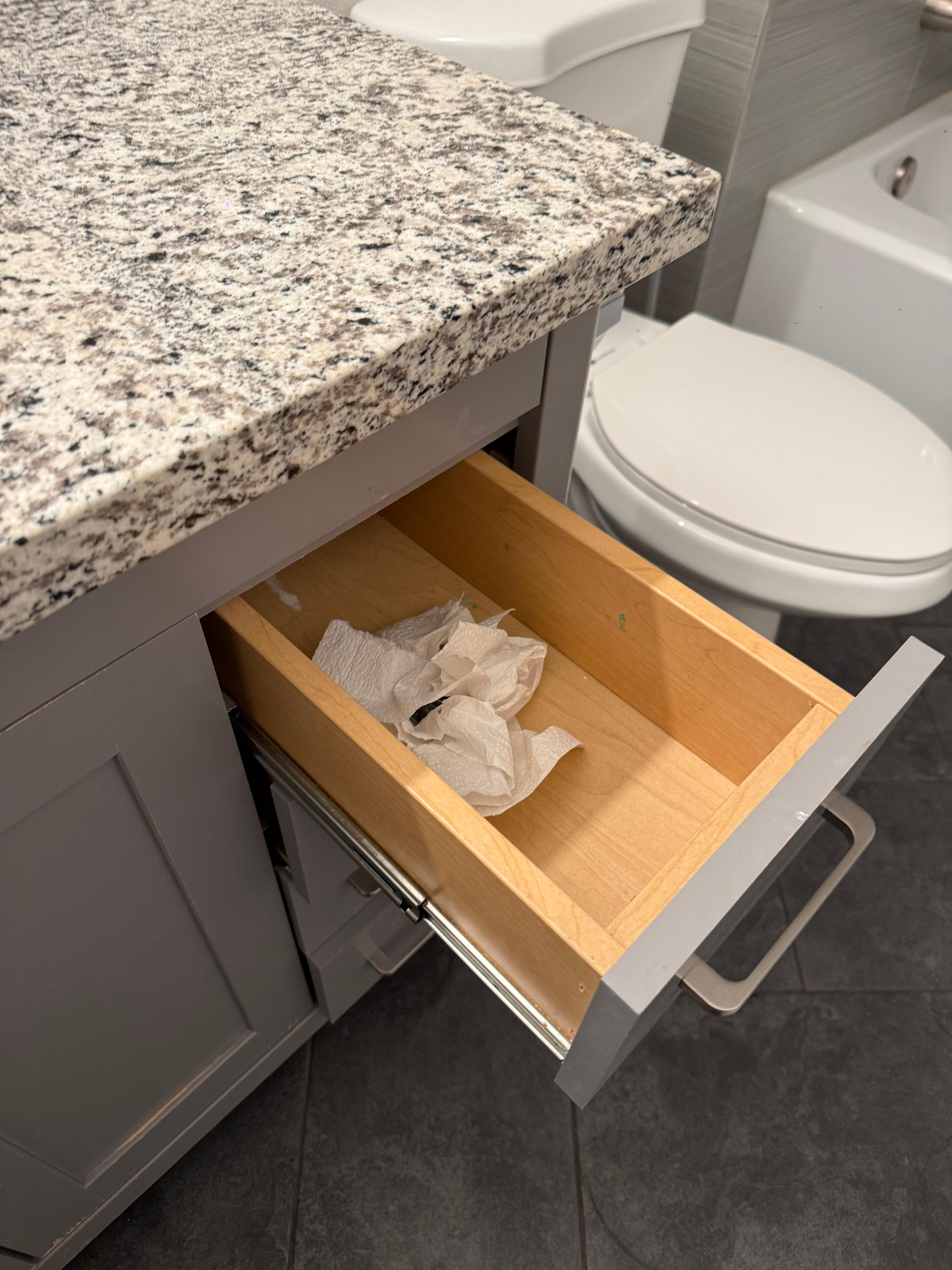 Trash left in the main bathroom drawer.