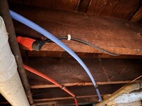 Extension cords permanently running to fixtures on the floor above.
