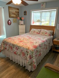 If early morning sun lite bothers you pick up a Dollar Tree table cloth to put over window above bed. Works like a charm!