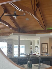 Grease on mirror in kitchen over stove