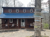 Teresa provides direction for where (and how) to park. The front porch gets early morning sunshine.
