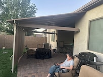 Moma Bear (Abby) enjoying some rest on our Vrbo patio.