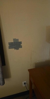 Hole covered with duct tape