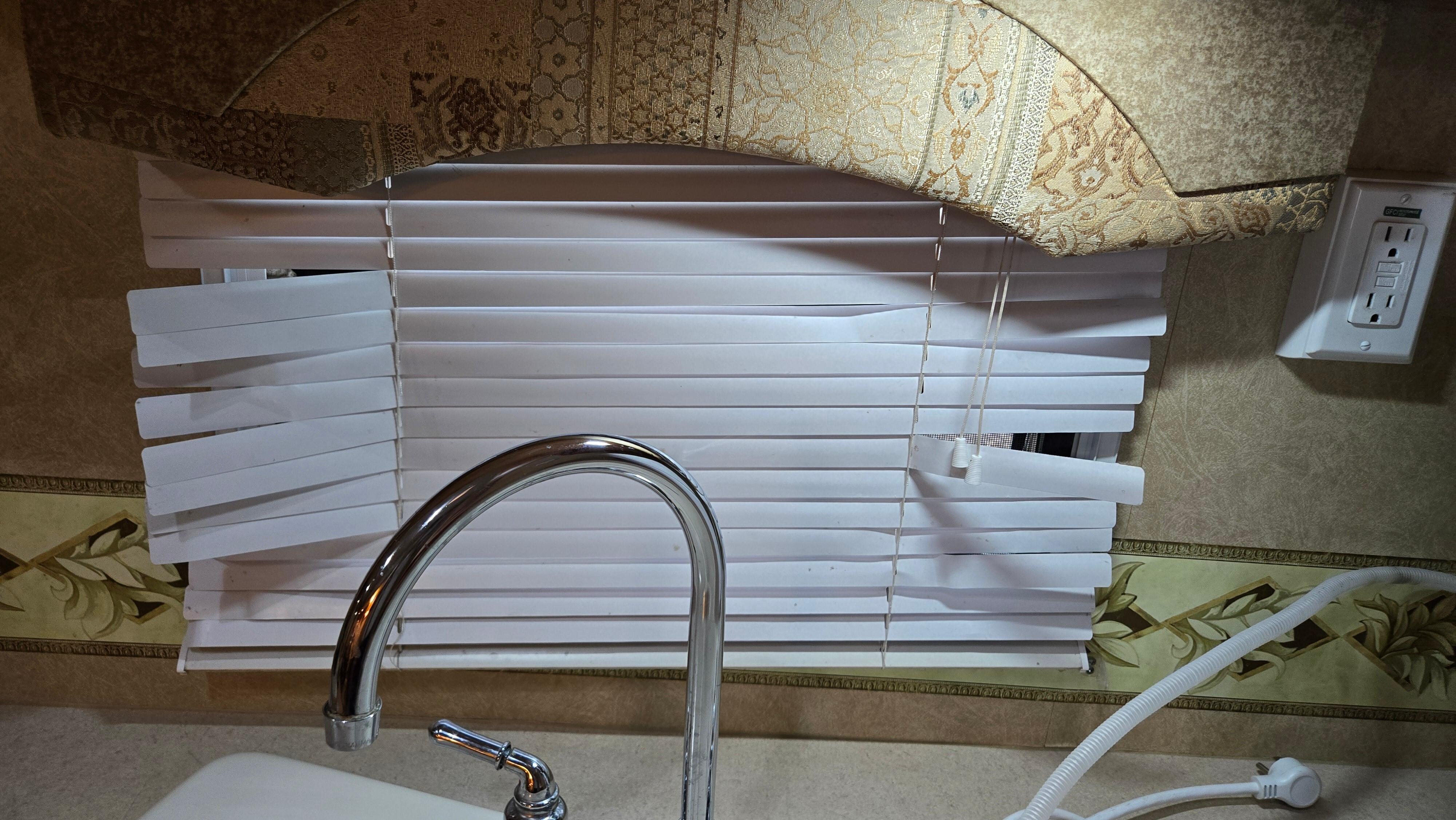 Blinds are beat up