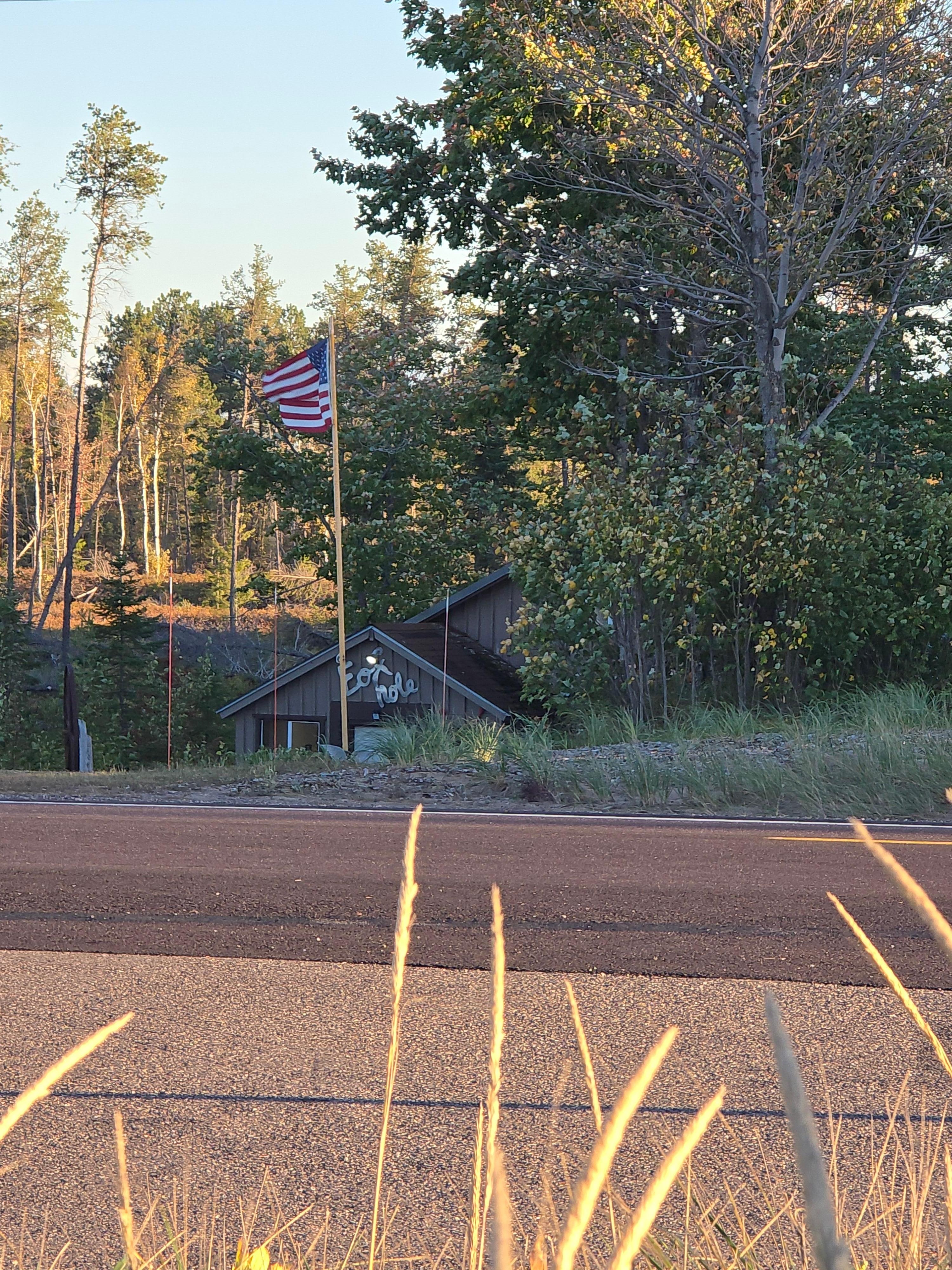 View from across the road at the overlook looking back at the cabin.