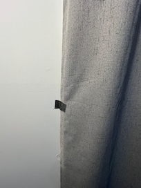 Tape to the curtains