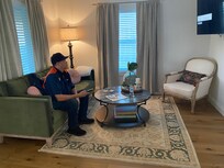 Very friendly sitting area with large tv screen.