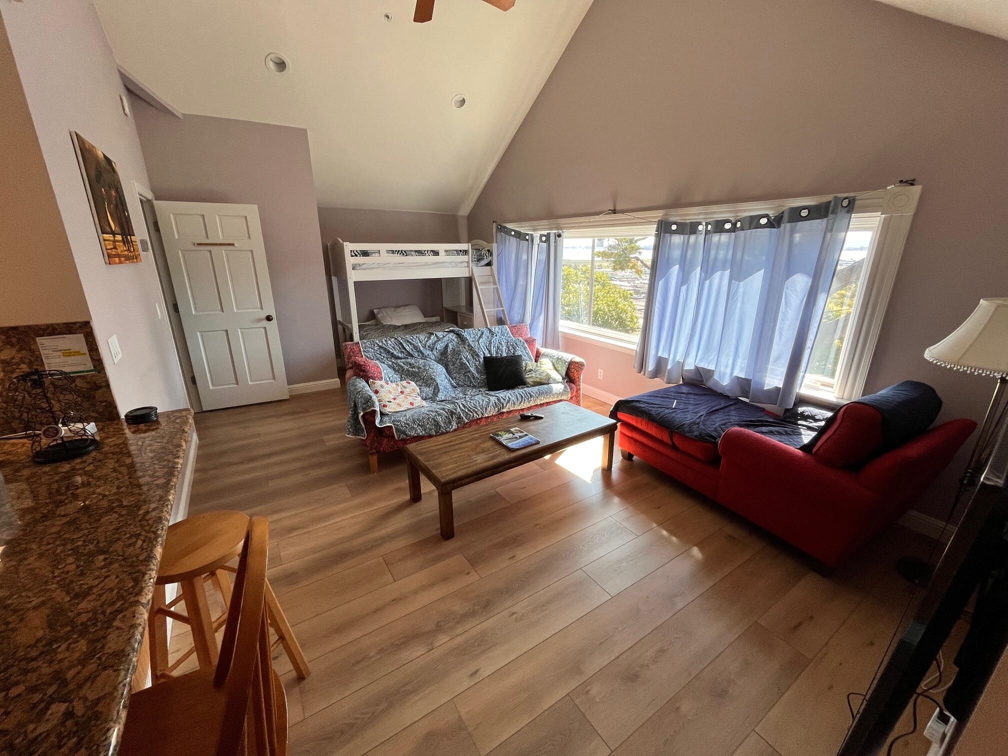 View from the entry towards the living room with bunk beds