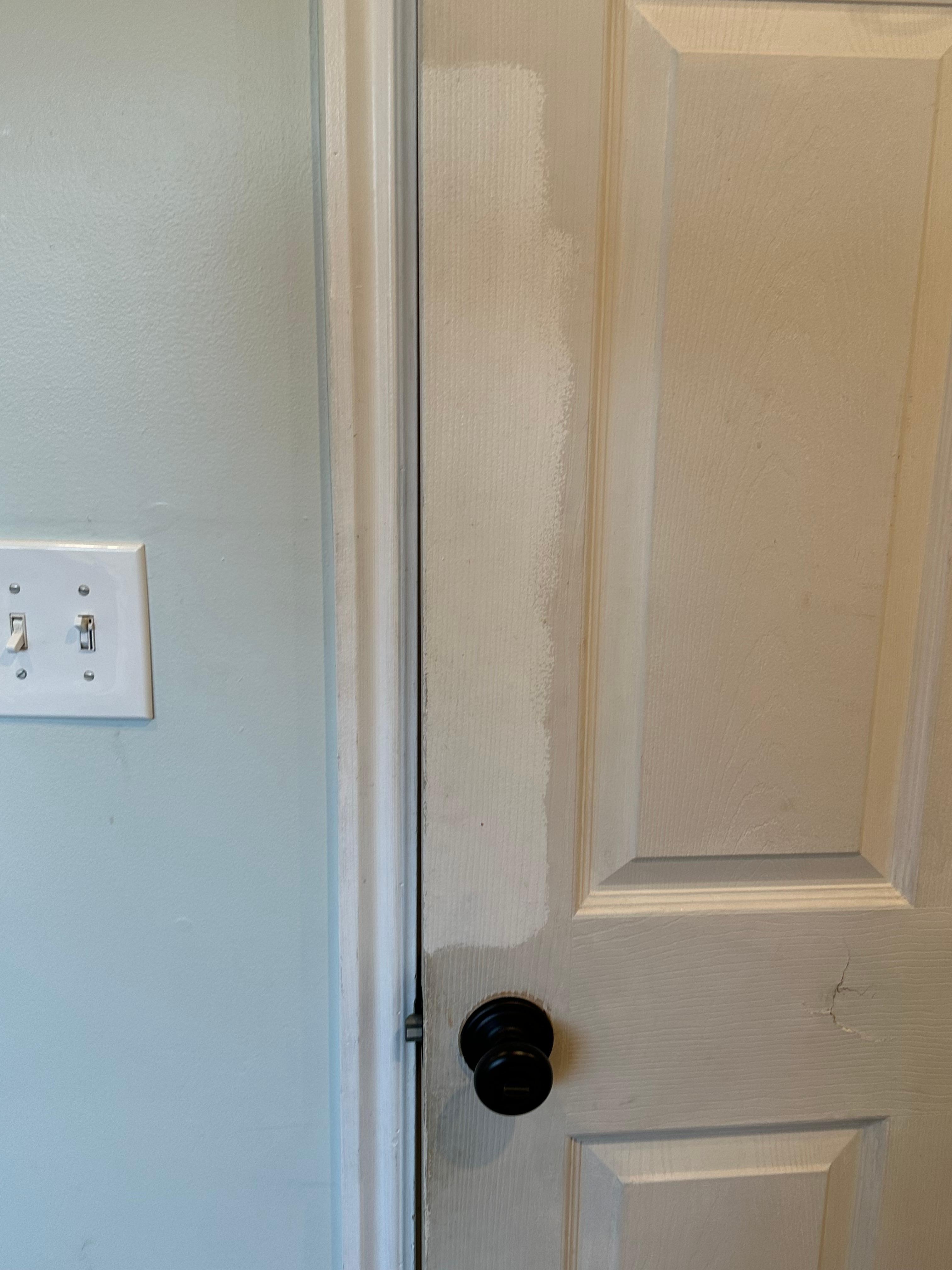 Paint job in master br - worn marks on wall where people have placed hands