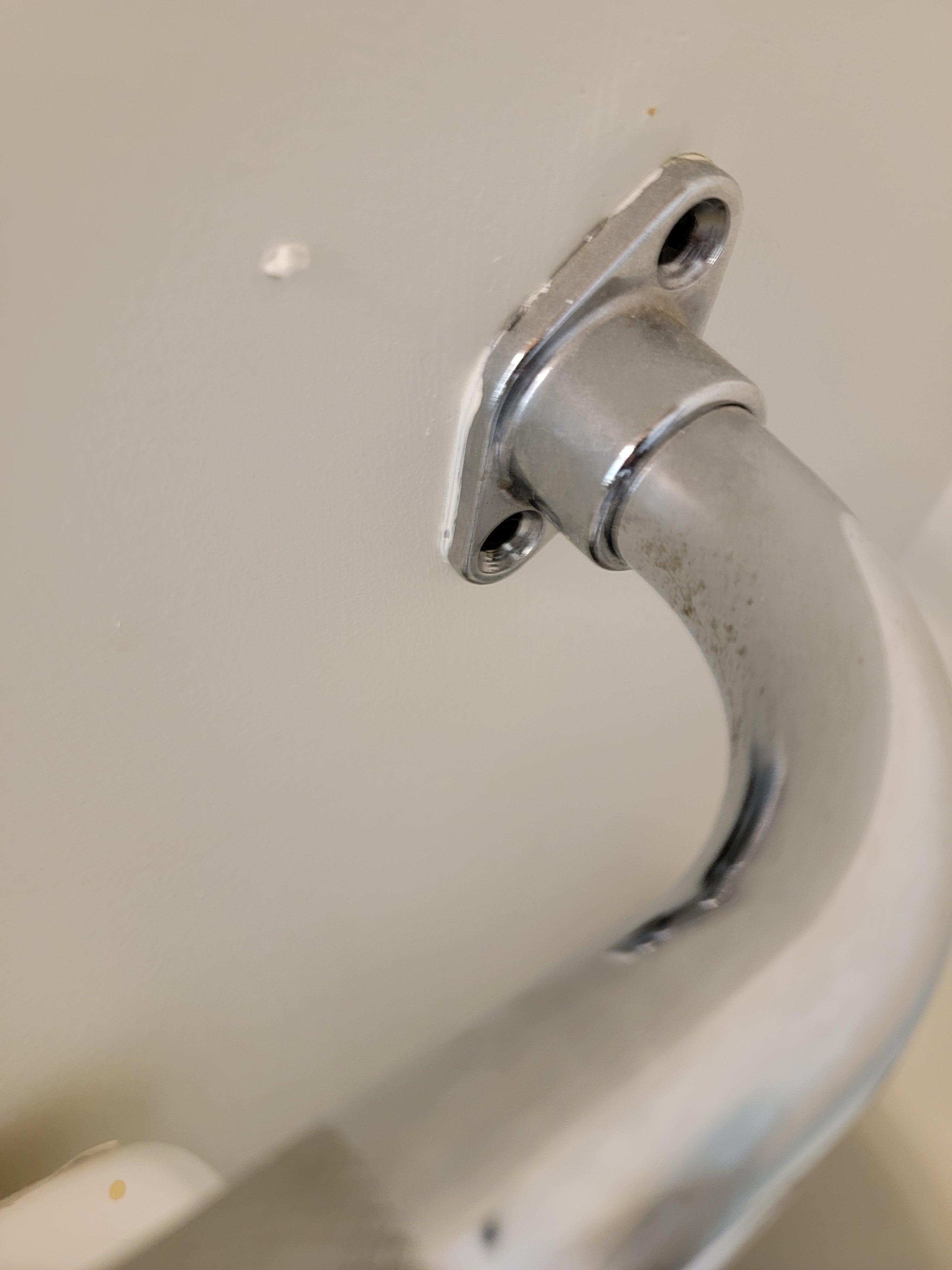 Sticky brown stuff onside side on tub handle
