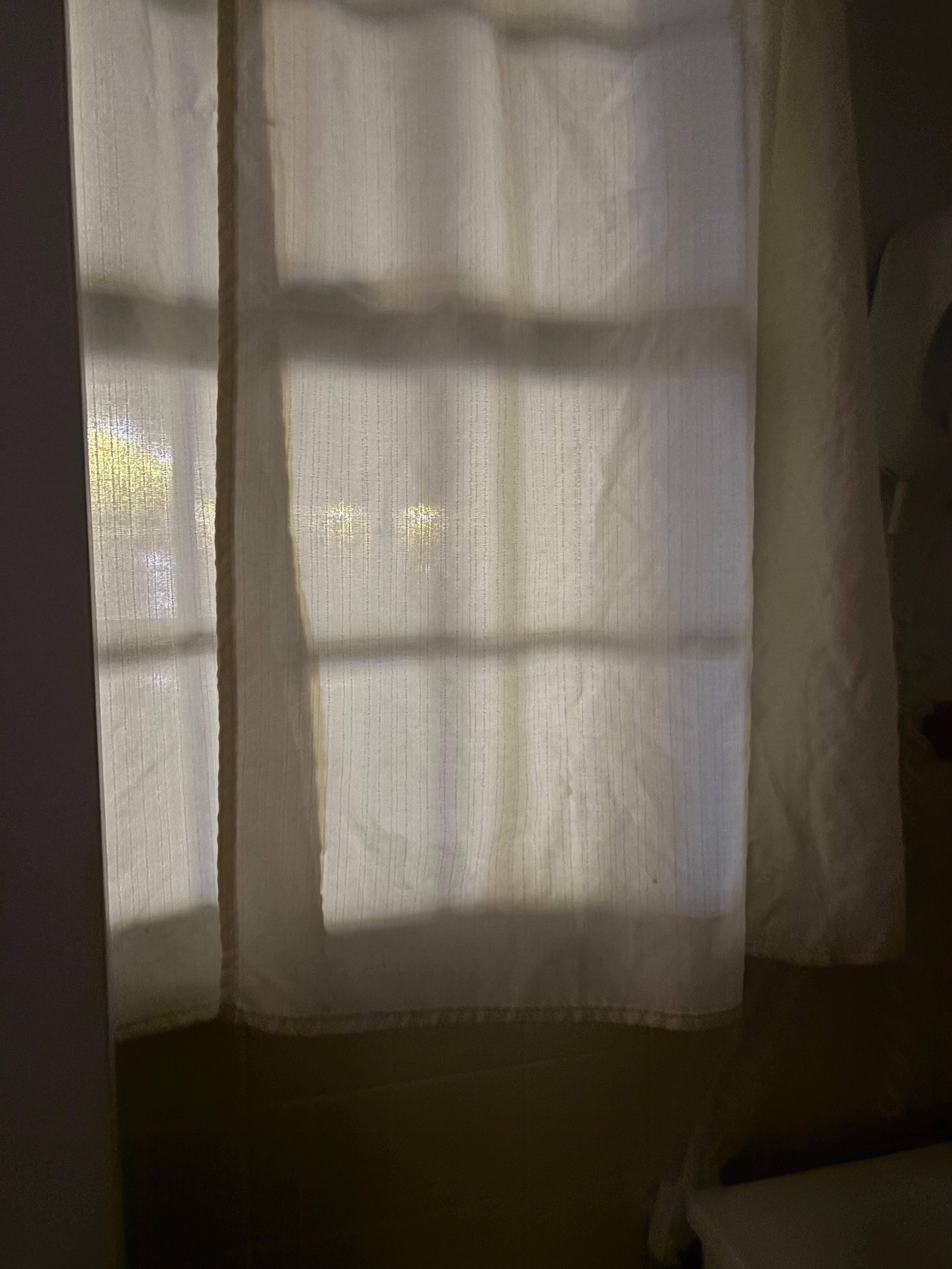 Sheer curtains on ground floor