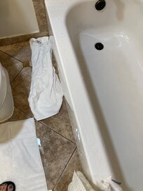 Soaking up water because no shower curtain liner was present