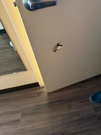 Kicked in hole in door.