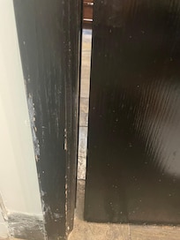 This is the bathroom door closed with a huge gap