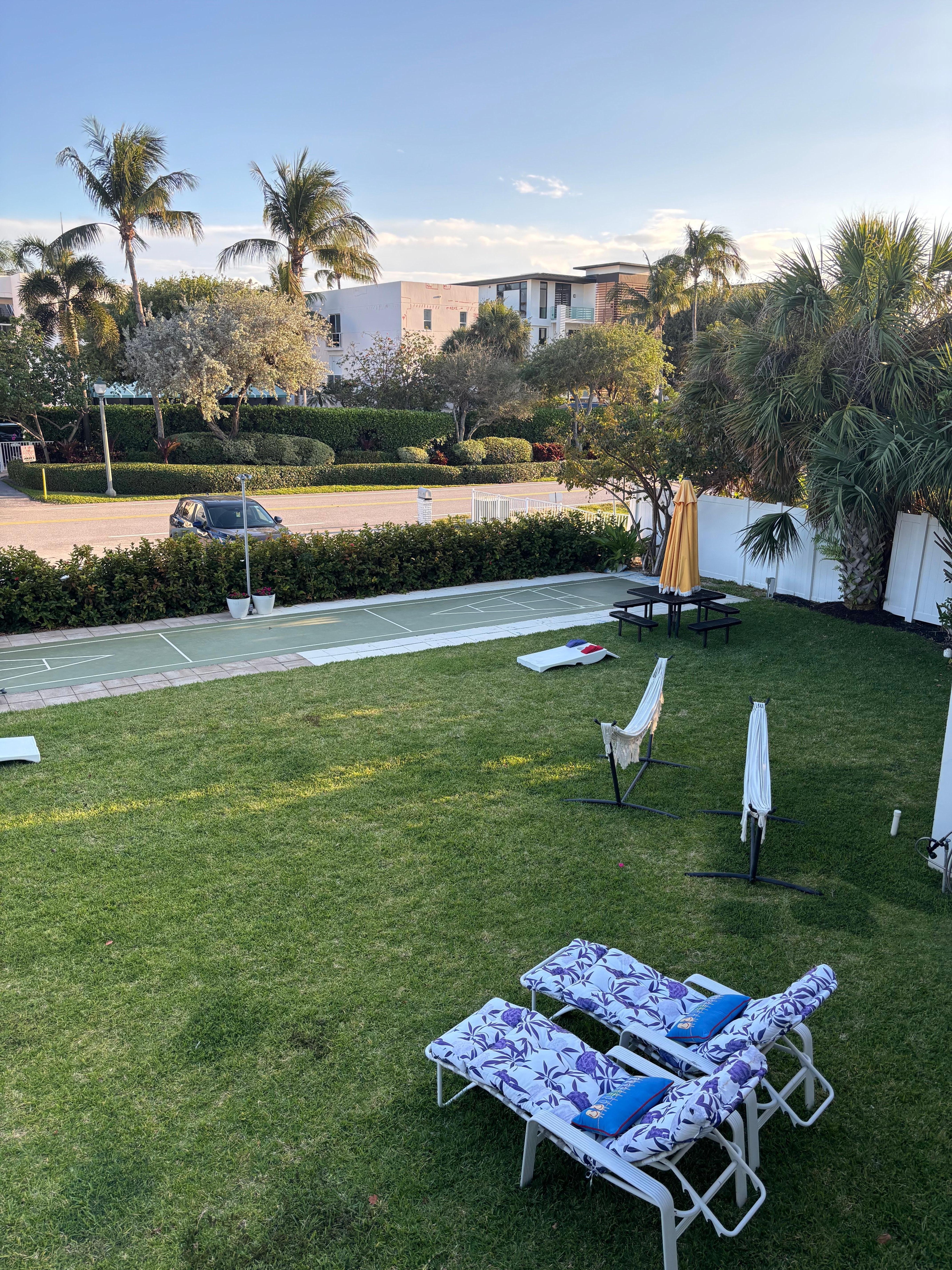 Property grounds. Cornhole, shuffleboard and hammocks.