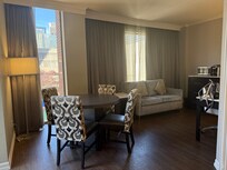 Living area with lots of windows.