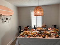 Dining room is open and plenty enough room with lots of seating. We moved things around to make a walk around brunch set up.