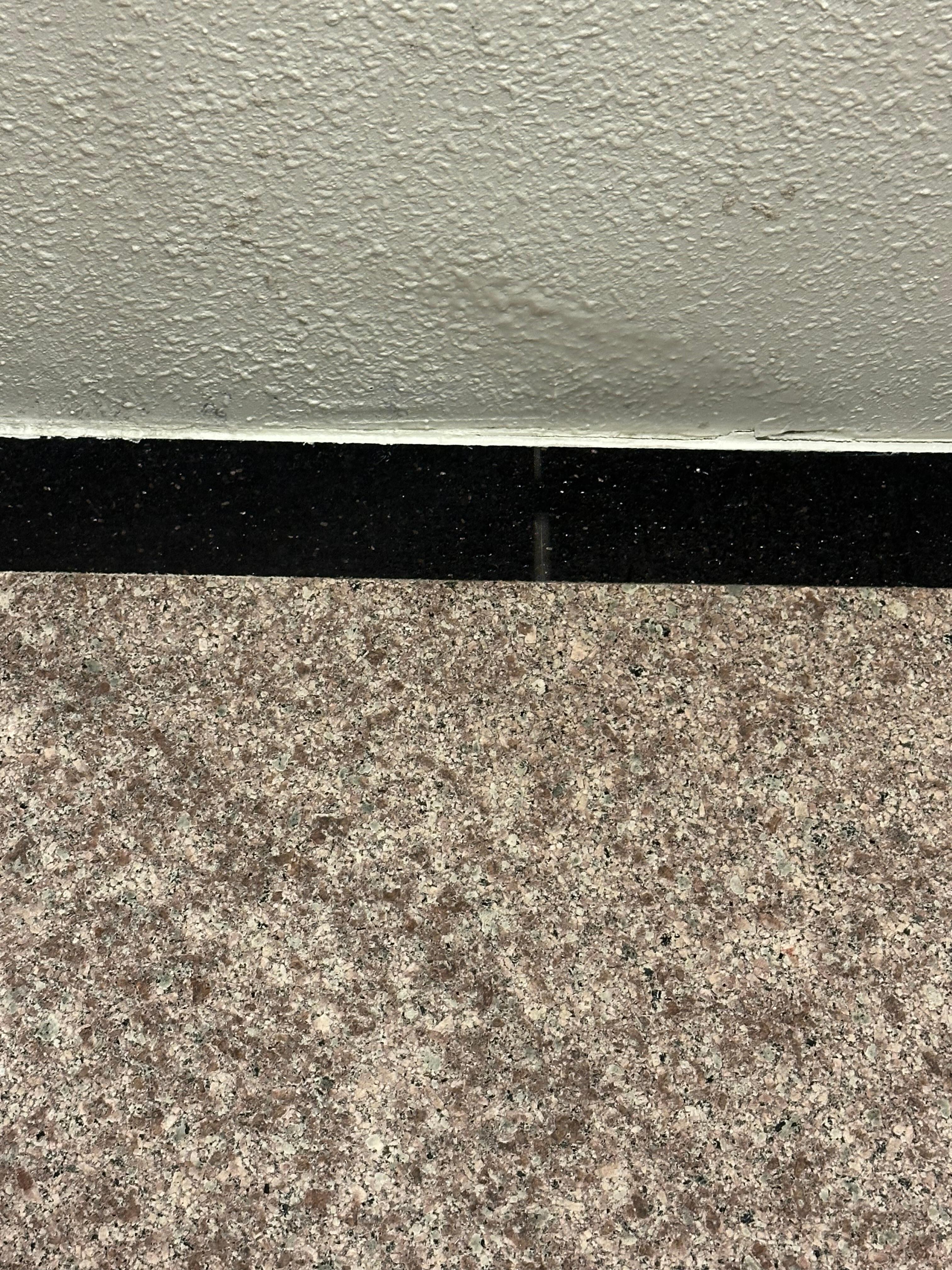 Picture of the ceiling above you as you showered water dripping down