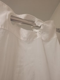 Ripped shower curtain