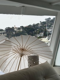 Parasols provide privacy - charming and utilitarian.