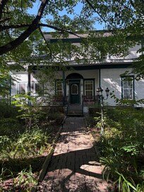 Looking at the house from the parking area