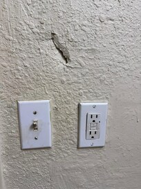 Bathroom vanity area. Mirror was falling apart and the sink counter was extremely low
