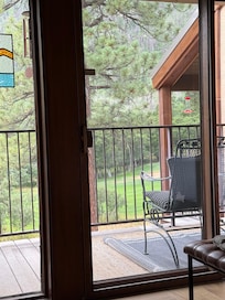 Nice view with glass sliding door leading to patio.
