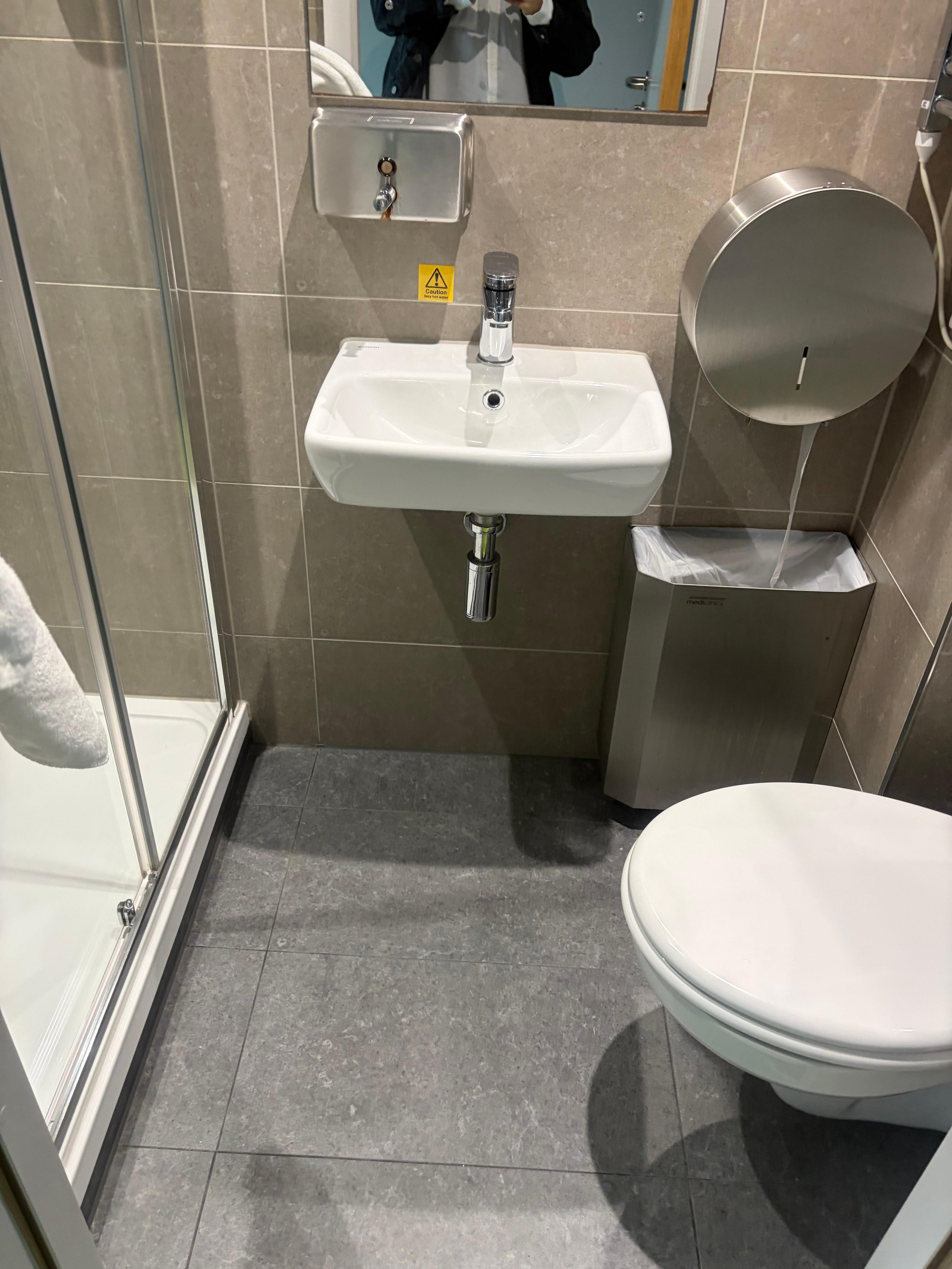 bathroom in room 1010. small, but manageable.