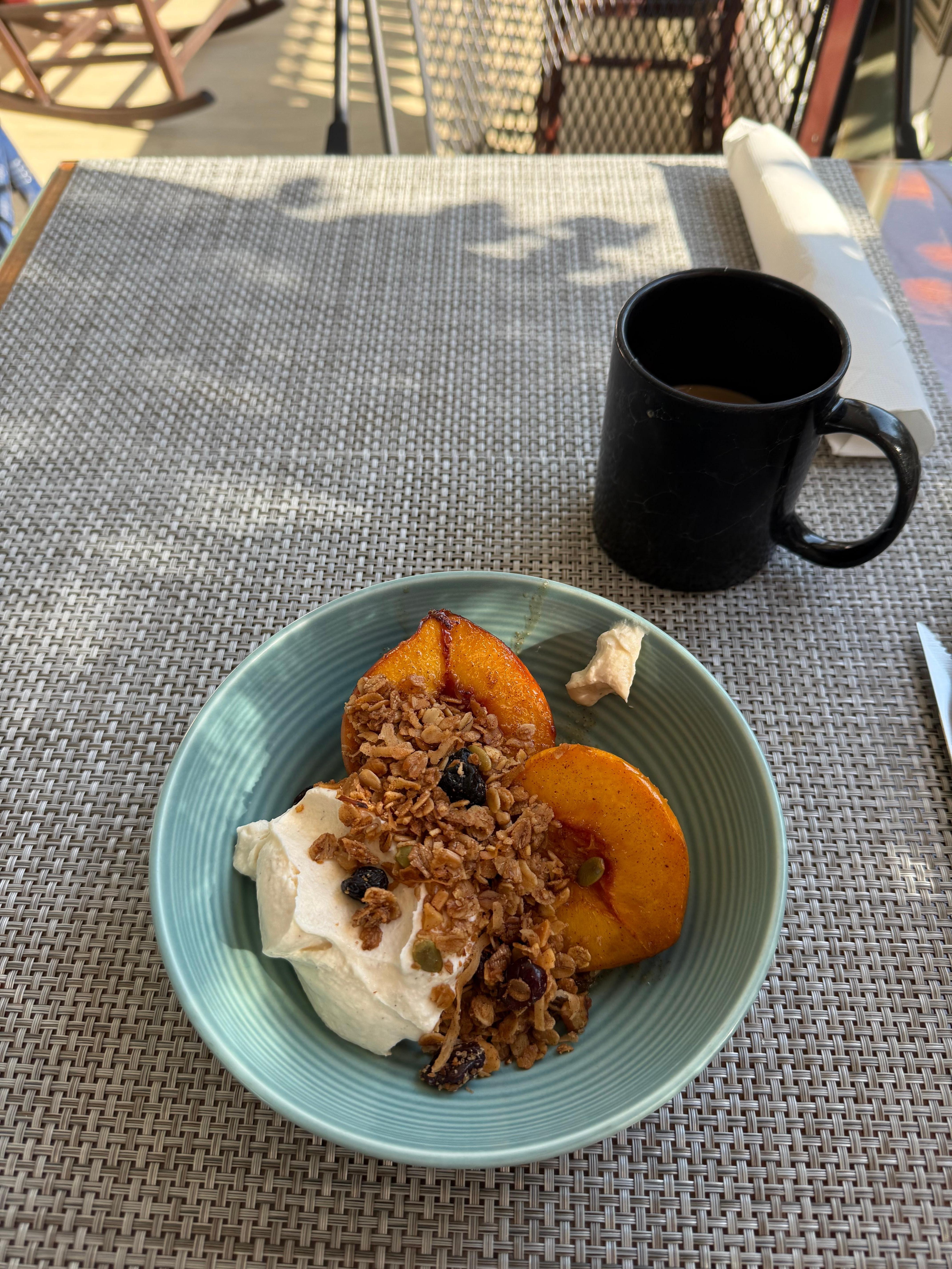 Greek yogurt with homemade granola and roasted peach. 