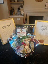 Such a fun welcome basket filled with local goodies ❤️