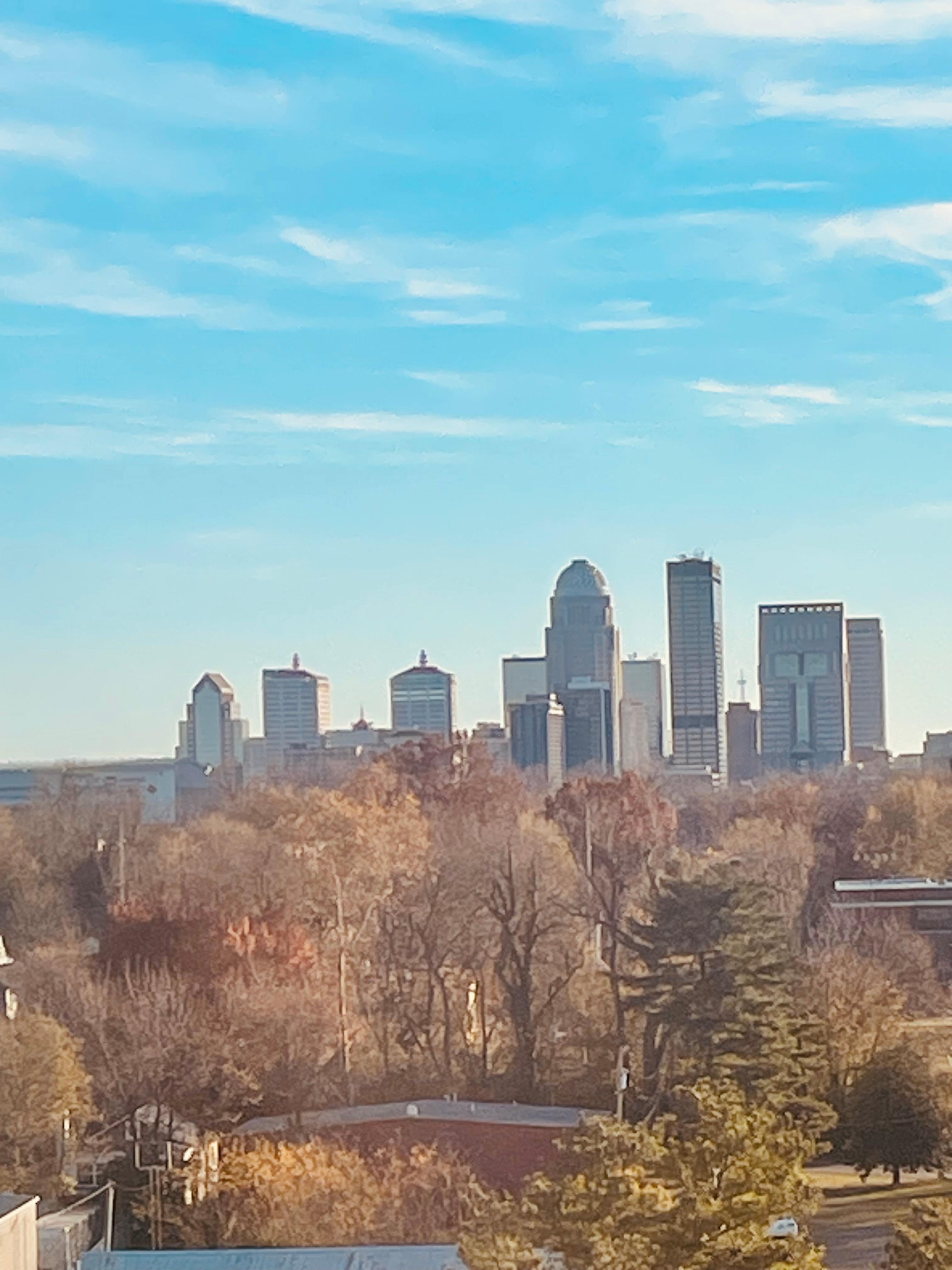 View of Louisville’s city skyline from hallway window . 