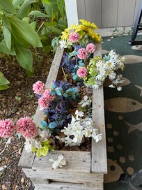 Broken plastic flowers, definitely not inviting