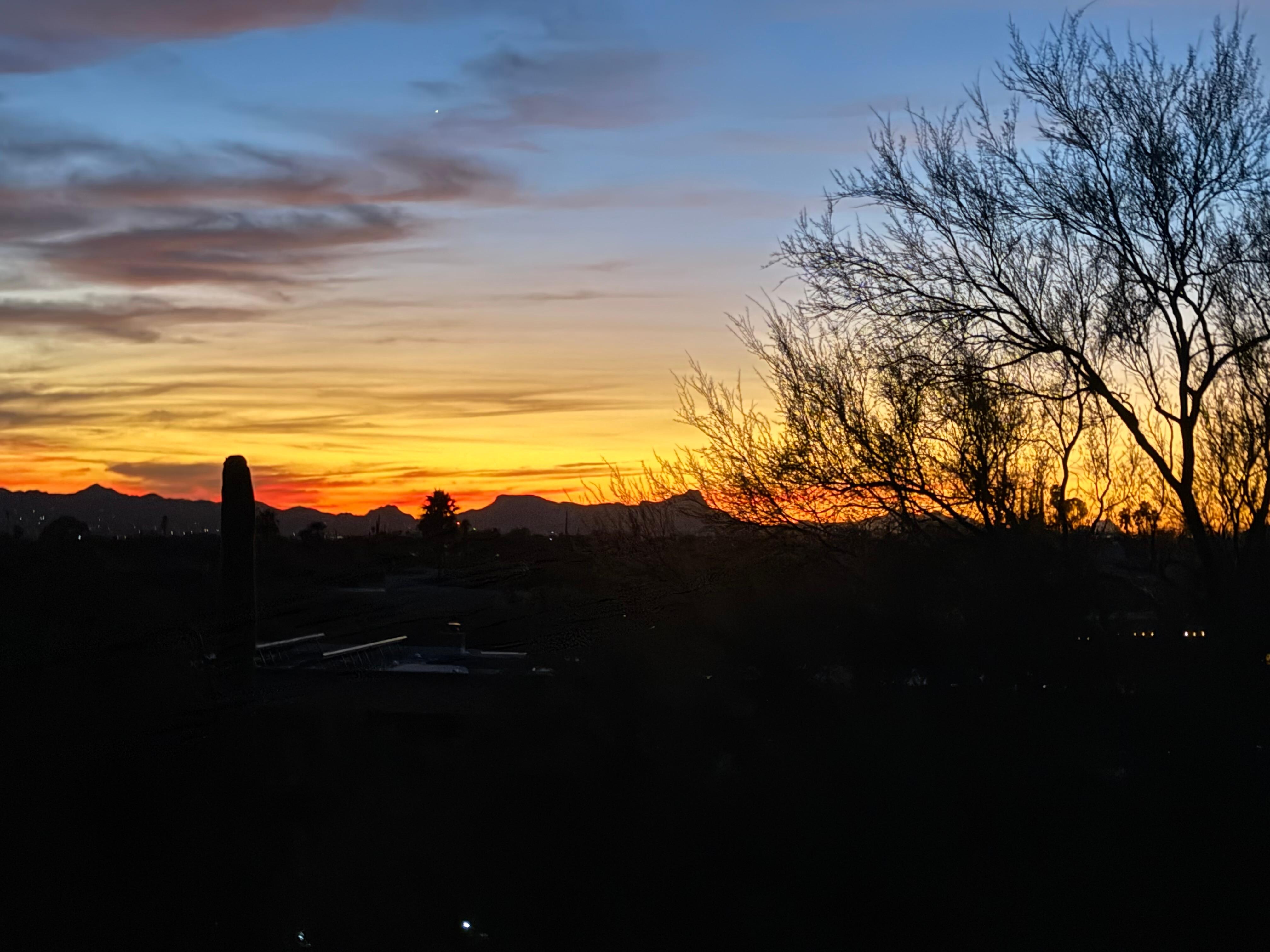 One of many beautiful sunsets from the patio above the pool area. 