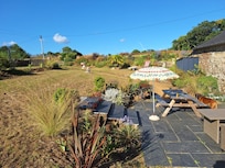 The garden and terrace on one side of the house. The whole garden was beautiful.