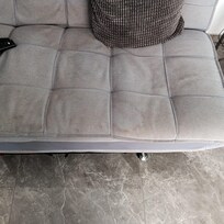stained and uncomfortable sofa
