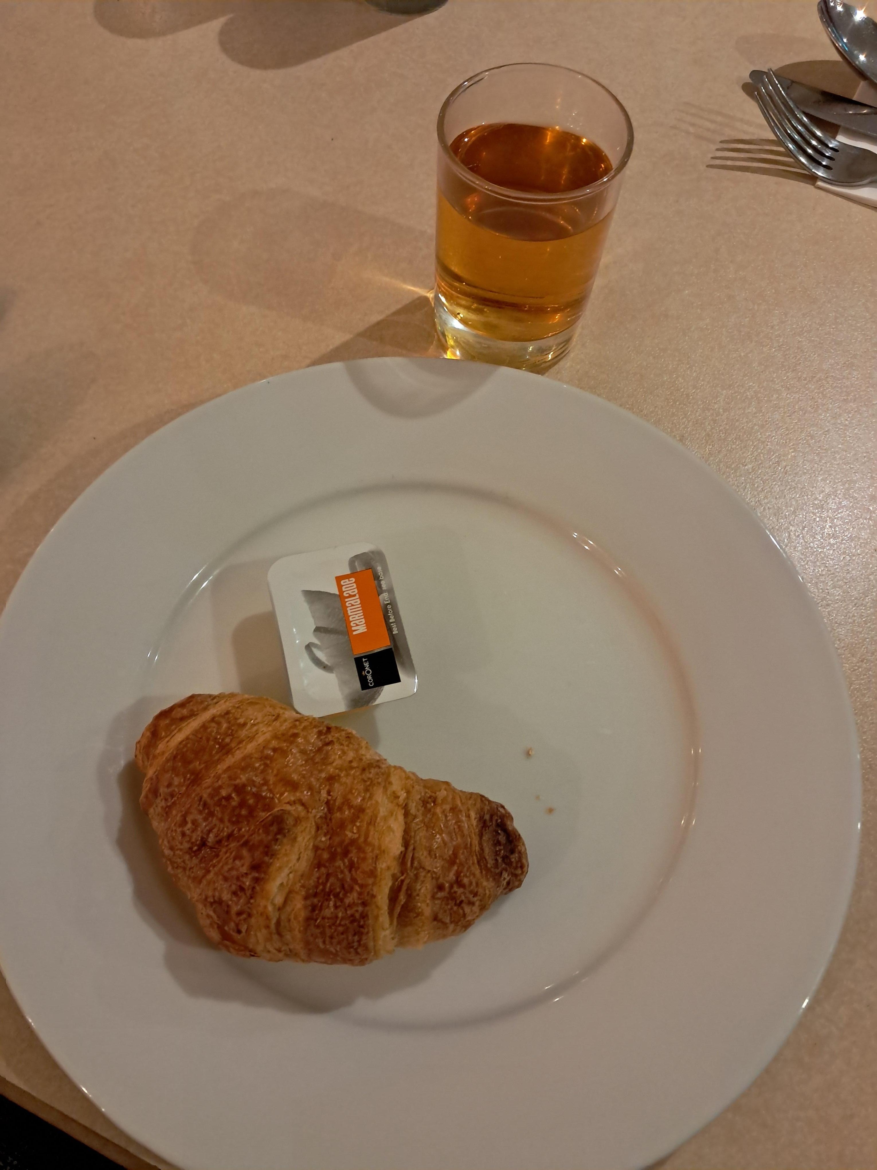 Breakfast,  micro croissant and one of two  marmalade packets in the buffet.  