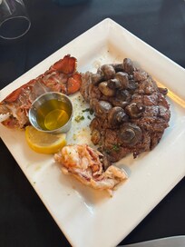 Dinner at the old Homestead steak and lobster with mushrooms