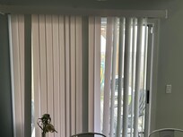 Sliding glass door blinds that were broken and missing most pieces