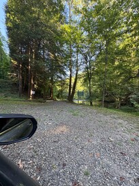 View of top falls lookout area from driveway