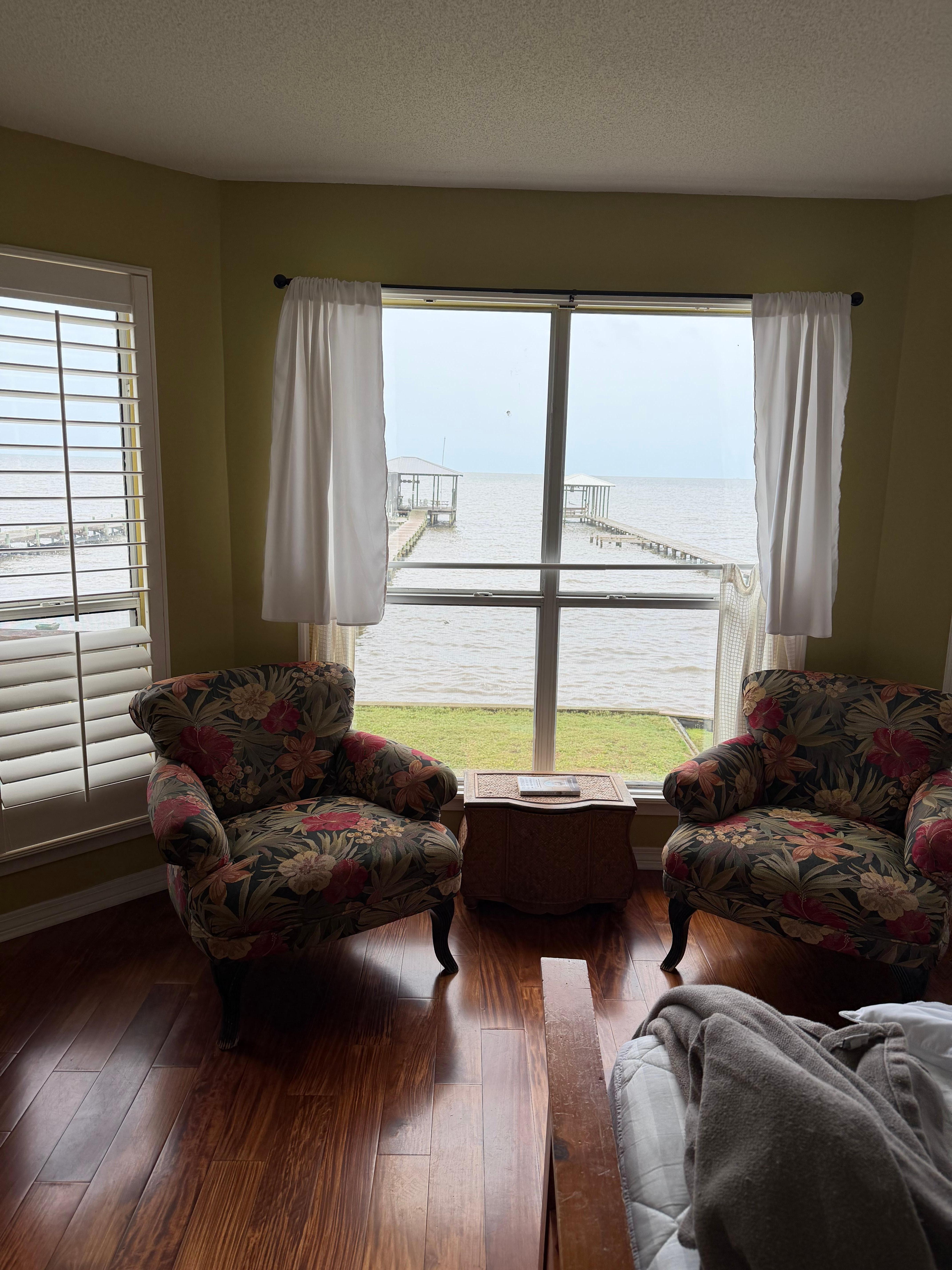 Curtains in primary room, instead of blinds. 